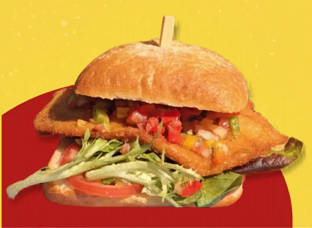 Clásico Milanesa — crispy schnitzel with fresh salsa and greens